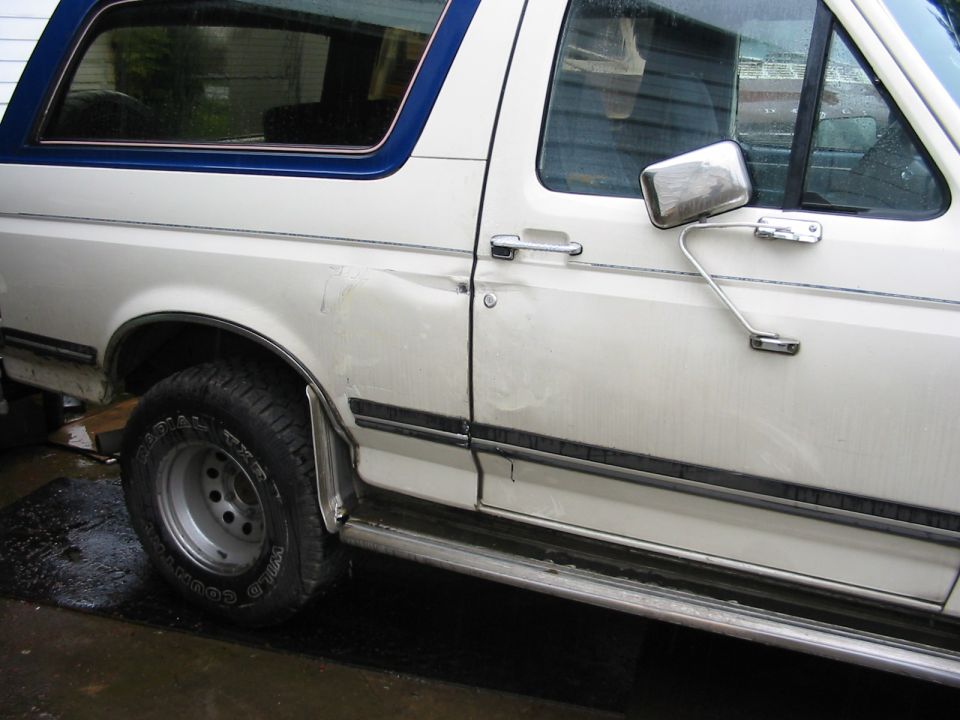 Dads old bronc got wrecked, this side hit a school bus