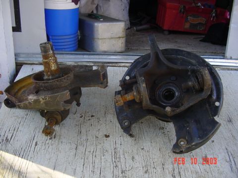 1989 Ford Bronco - Two vehicle suspension parts are shown, one on the left and one on the right.