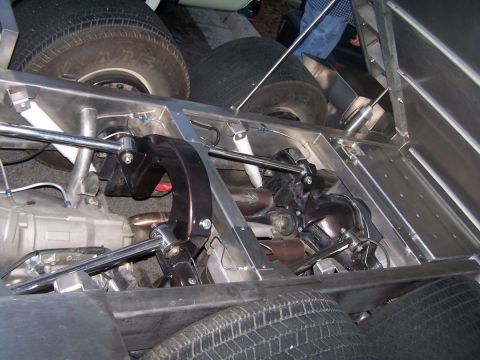 1990 Ford Bronco - Custom chassis components and suspension system visible in detail.