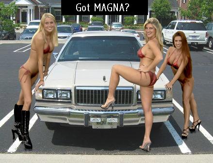 1988 Mercury Grand Marquis - Three women in bikinis pose around a white sedan in a parking lot beneath a Got MAGNA caption.