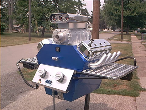 1978 Ford Bronco - This custom BBQ grill is designed to resemble a V8 engine with a prominent supercharger and chrome exhaust pipes.
