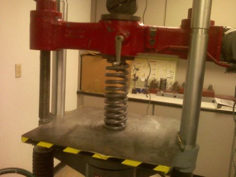 2001 Ford F-150 - Using a Universal Testing Machine to try and compress the coils.