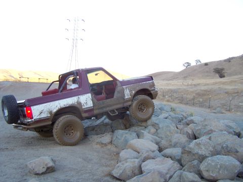 1991 Ford Bronco - This 1991 Ford Bronco navigates a rocky trail, its off-road capabilities.