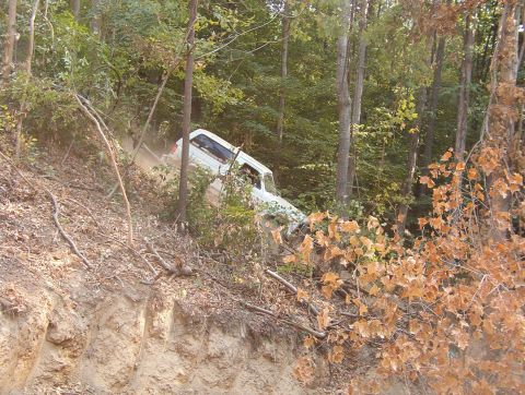 1983 Ford Bronco - Ministock7x coming down a steep trail that dumps into a creek about 30' straight down.