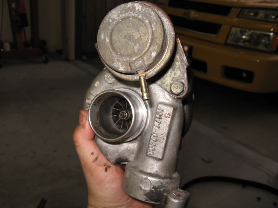 Turbocharger with part number 49177-02400 visible