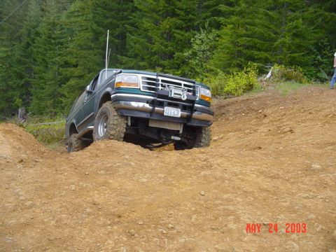 1989 Ford Bronco - Greg climbing the steep hill on powerline