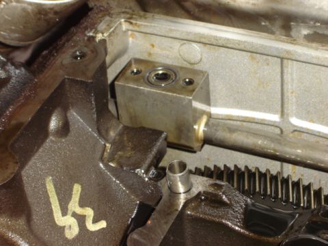 1992 Ford Bronco - This is a close-up view of an engine component, possibly part of the oiling system, with a gear visible.