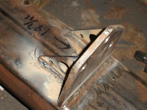 1989 Ford Bronco - Close-up of a welded metal bracket, showing handwritten measurements.
