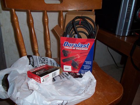 2003 Ford Ranger - New Duralast spark plug wires and Motorcraft spark plugs are ready for installation.