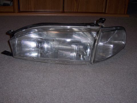 1987 Volkswagen Golf - A single car headlight assembly is shown, likely a replacement part.