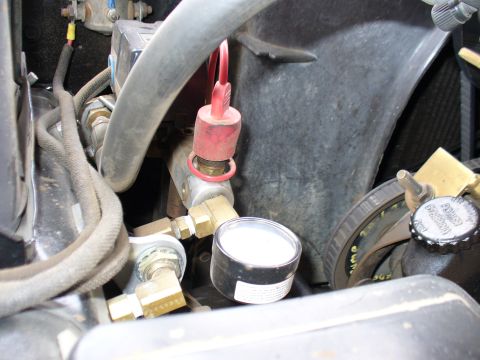 1978 Ford Bronco - Detail of an air system gauge and plumbing, likely part of an aftermarket installation.