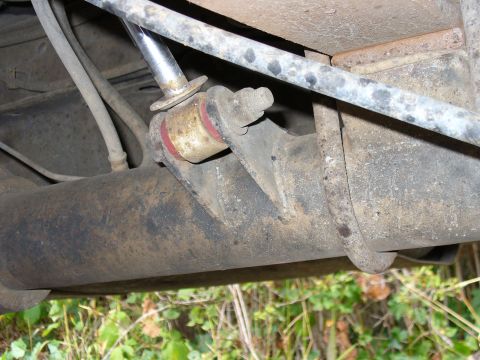 1978 Ford Bronco - Rear axle shock mount detail, showing bushings and mounting bracket.