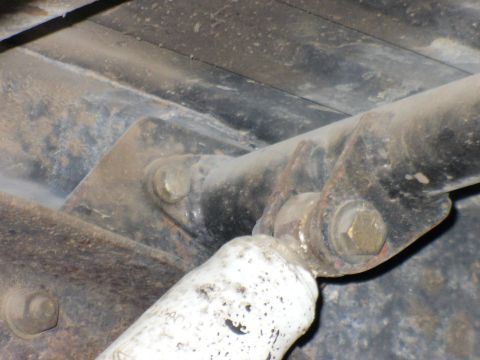 1978 Ford Bronco - This image shows a close-up of a vehicle's rear shock mount, not a specific model year.