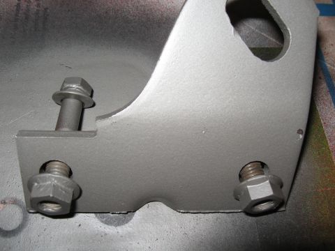 1968 Shelby GT500 - A metal bracket, likely a tie-down bracket, is shown after being painted.