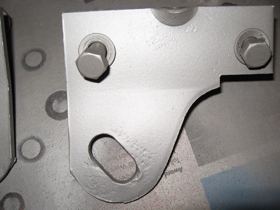Gray tie down bracket with two bolts