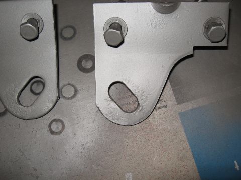 1968 Shelby GT500 - Painted metal brackets with visible bolts and mounting holes.