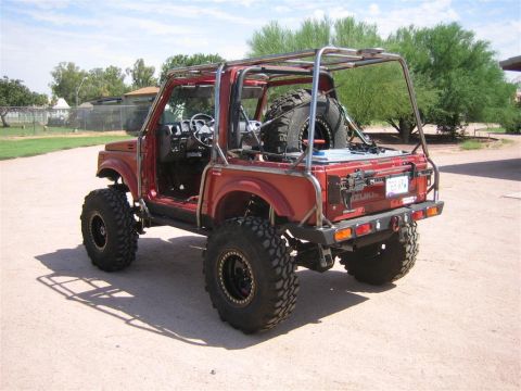 1987 Suzuki Samurai - This modified Suzuki Samurai is equipped with a full roll cage and oversized tires for off-road use.