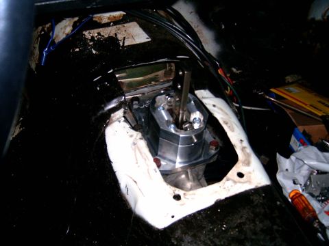 1978 Ford Mustang II - A custom shifter assembly is installed in the interior of a vehicle, replacing the original components.