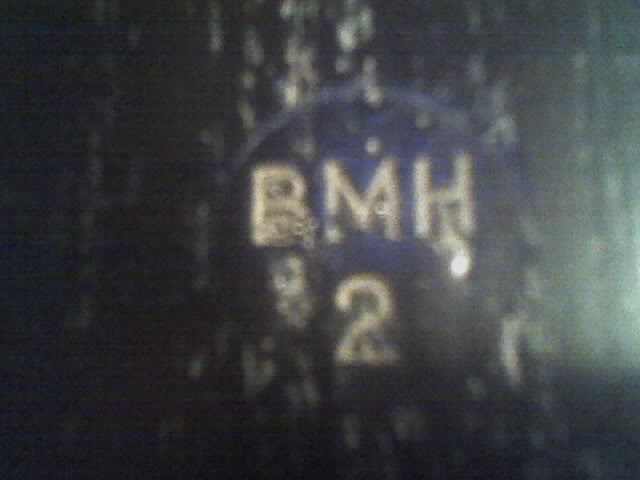 Part with blue circle showing text 'BMH' and the number '2'