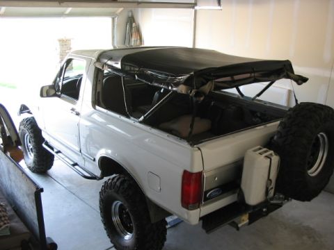 1995 Ford Bronco - Shadofax fits in easy with 8' doors. Ceiling is also 12', so next project is a hoist to put hardtop up above.