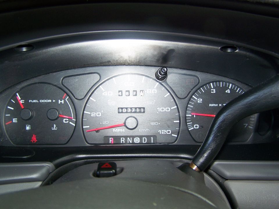 2003 Ford Taurus dashboard with odometer showing 103711 miles