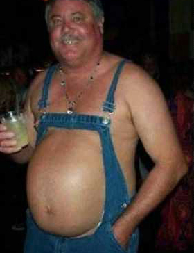 1971 Ford Ranchero - A man in overalls holds a drink while posing for a photo.