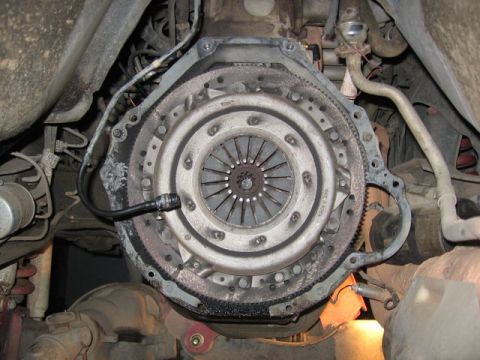 1989 Ford Bronco - Close-up view of a vehicle's clutch assembly, showing the pressure plate and disc.