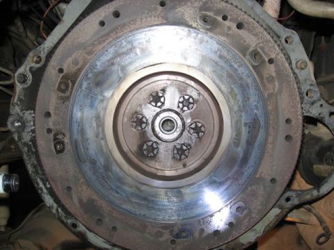 1989 Ford Bronco - Close-up view of an engine flywheel, likely part of a clutch replacement or upgrade.