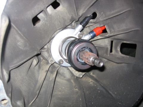 1989 Ford Bronco - This image shows a clutch release bearing and the splined input shaft of a transmission.