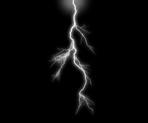 1995 Ford Bronco - Lightning strikes during a storm, captured against a dark sky.