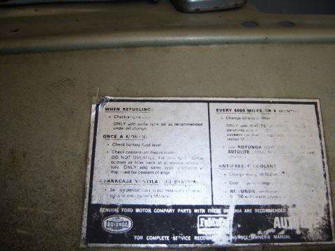 1967 Ford Ranchero - A decal provides service information for a vehicle, including fluid checks and filter changes.