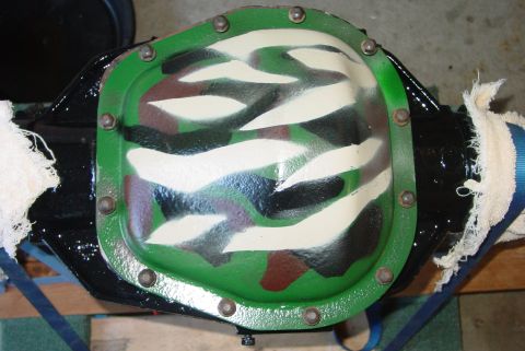 1993 Ford Bronco - A differential cover painted with camouflage is shown.
