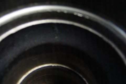 1993 Ford Bronco - Interior view of a cylinder wall, showing wear and scoring.