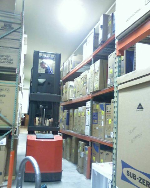 2006 Ford E350 - Flat-panel TVs in our warehouse.