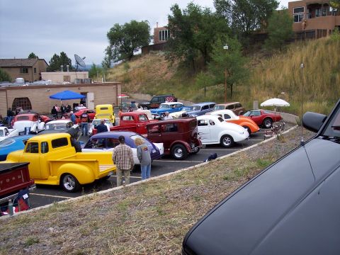 1972 Ford Ranchero - A gathering of diverse vintage automobiles are parked in an outdoor lot.