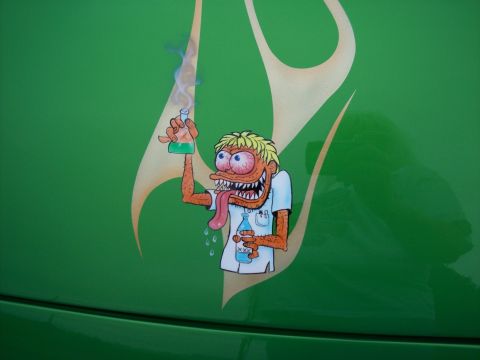 1972 Ford Ranchero - A green car features a custom graphic of a mad scientist holding a bubbling beaker.