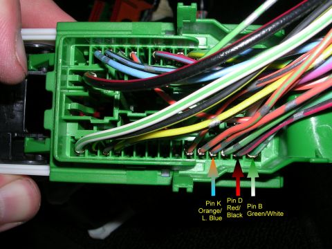 2007 Mazda 3 - Close-up of a green wiring harness connector with various colored wires and labeled pins for Pin K, Pin D, and Pin B.