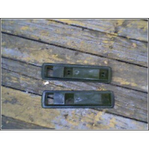1973 Ford Ranchero - Pair of car door handles shown on a wooden surface.