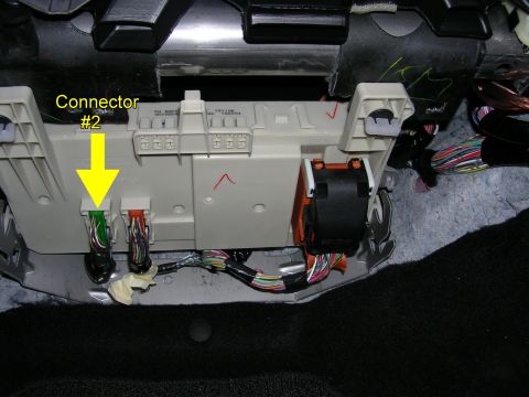 2007 Mazda 3 - Close-up view of vehicle interior wiring harness connectors, one labeled 'Connector #2'.