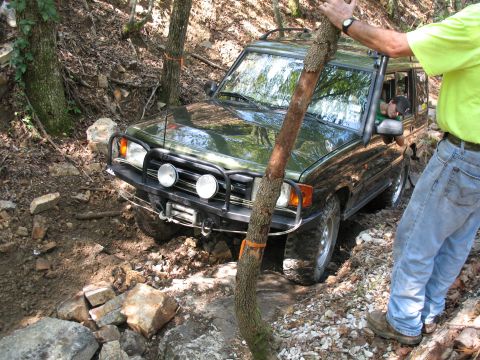 1993 Ford Bronco - Disco Dude #2 approaching an obstacle that gave all the Land Rovers trouble.
