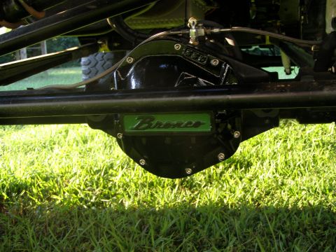1993 Ford Bronco - Close-up of a vehicle's rear differential housing, identified by a green 'Bronco' emblem.
