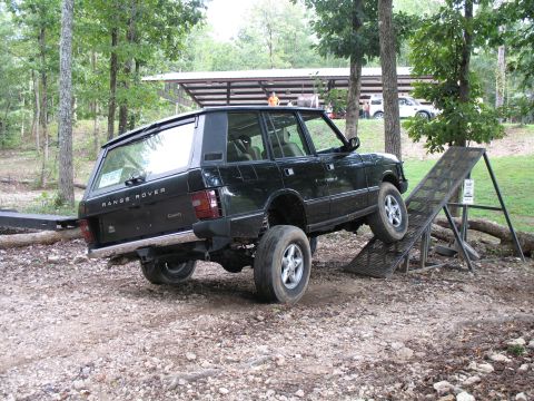 1993 Ford Bronco - Range Rover on the ramp. It didn't make it up very far, but it looked pretty neat. He needed to pop his right-rear coil back in.