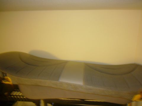 2000 Ford Crown Victoria - Car seat with gray fabric and a lighter gray center panel, likely from a vehicle.