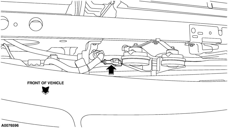 Underbody line drawing with arrow marking an electrical connector beside the horns