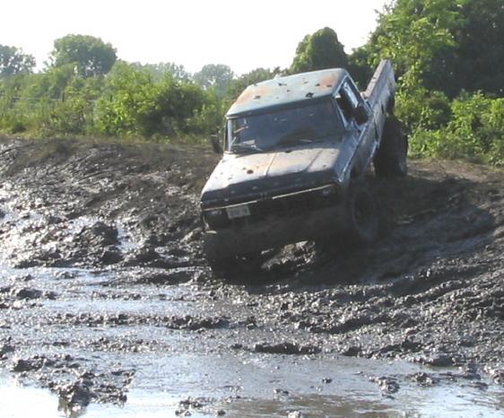 1979 Ford F-250 stuck in mud puddle, front 3/4 view