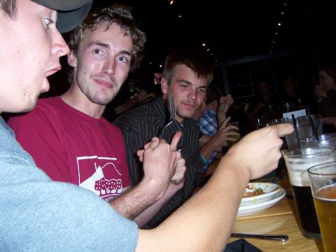 1991 Ford Bronco - A group of friends enjoy a meal and drinks together at a restaurant.