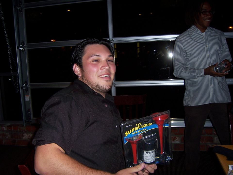 Man holding Super-Loud air horns