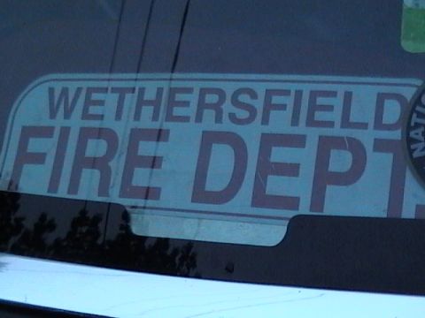 1990 Ford Bronco - A sticker reading "Wethersfield Fire Dept" is visible on the tinted window of a vehicle.