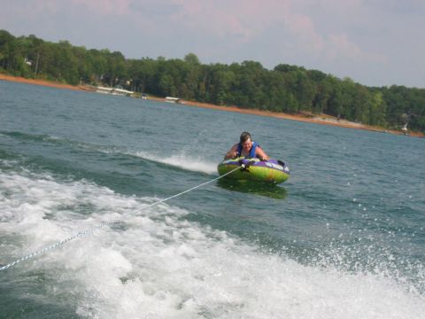 1985 Ford LTD Crown Victoria - A person enjoys tubing on Lake Hartwell, SC on a summer day.