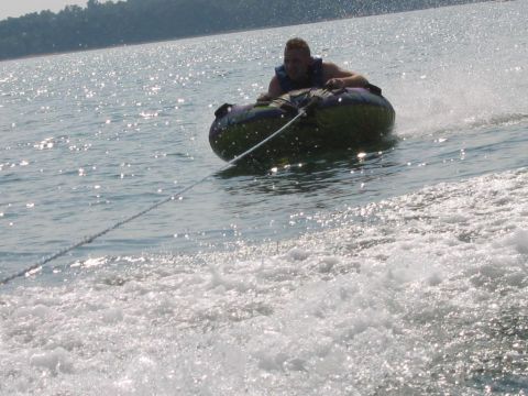 1985 Ford LTD Crown Victoria - A person enjoys tubing on a sunny day at Lake Hartwell, SC.